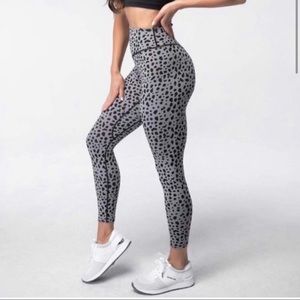ISO: midnight snow leopard legging